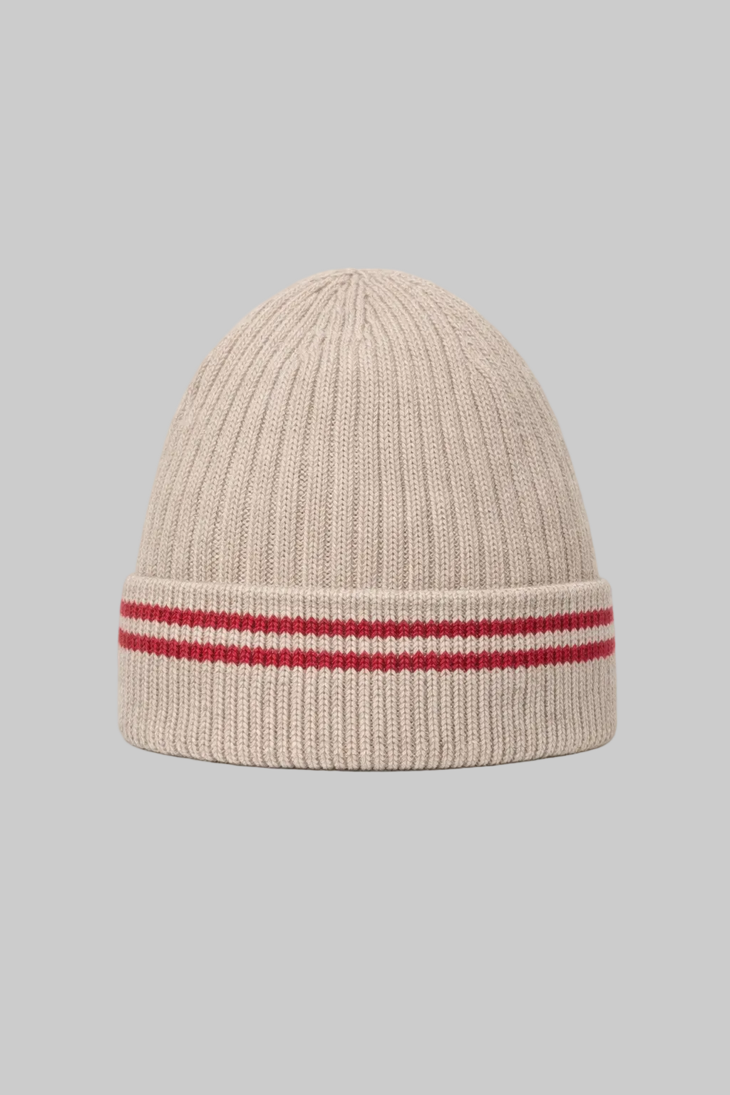 Beige knit beanie with red stripes on a light gray background